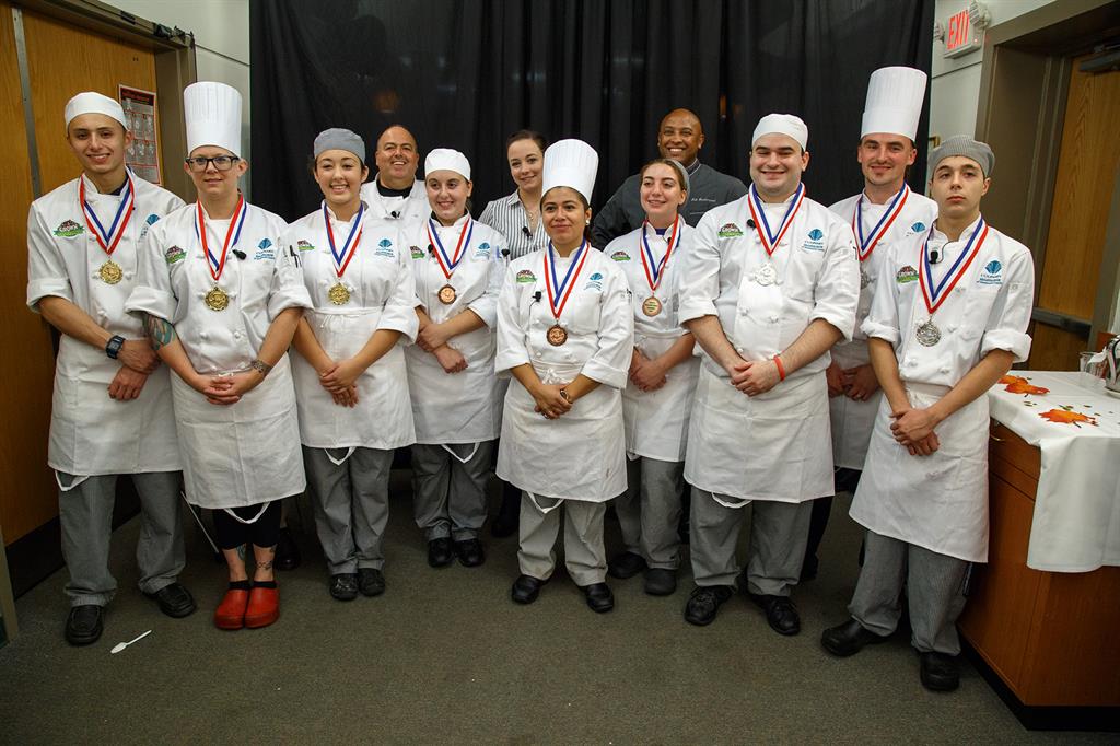 Local celebrity judges join the three competing teams who were awarded gold, silver and bronze medals at the Grown in Monmouth Culinary Competition on Oct. 17 in Asbury Park, NJ. 